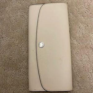 Michael kors clutch , beige , no stains or scratches